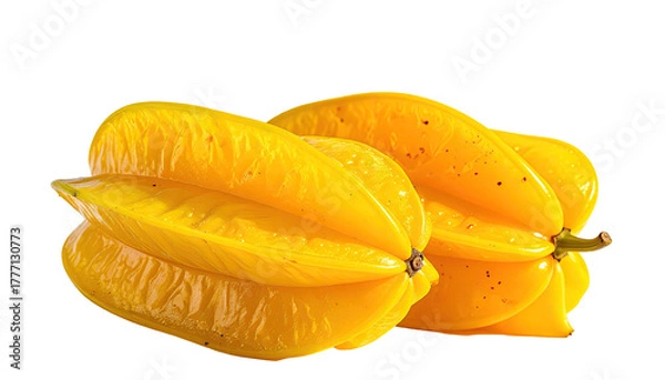 Obraz Two ripe yellow star fruits, close-up against a black background