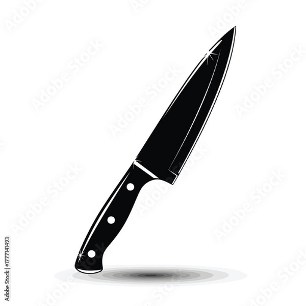 Fototapeta A sharp black chefs knife with a black handle, casting a shadow on a
