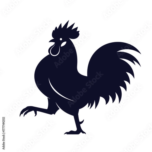 Fototapeta Silhouette of a proud rooster standing on one leg with its tail feathers spread wide