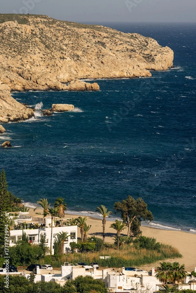 Fototapeta Coastal village of Agua Amarga and surrounding cliffs, Cabo de Gata.
