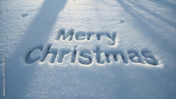 Obraz A Winter's Greeting: Merry Christmas Carved in Fresh Snow, Festive Message Etched in Pristine White Powder , Holiday Wishes in Snow: Merry Christmas Inscription on a Winter's Day