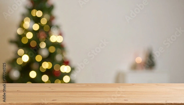 Obraz Empty Wooden Table in Front of Blurred Christmas Tree with Warm Lights