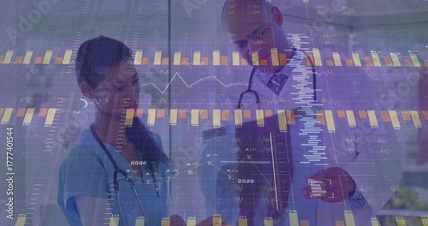 Obraz Examining nurse and doctor analyzing data in corridor, with stethoscopes, clipboard and charts