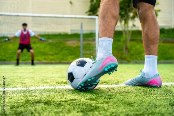 Obraz Soccer player preparing a powerful penalty kick