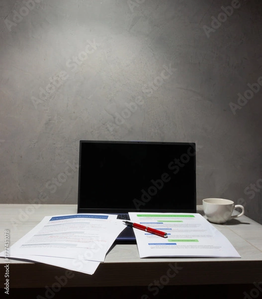 Fototapeta proofreading paperwork on table