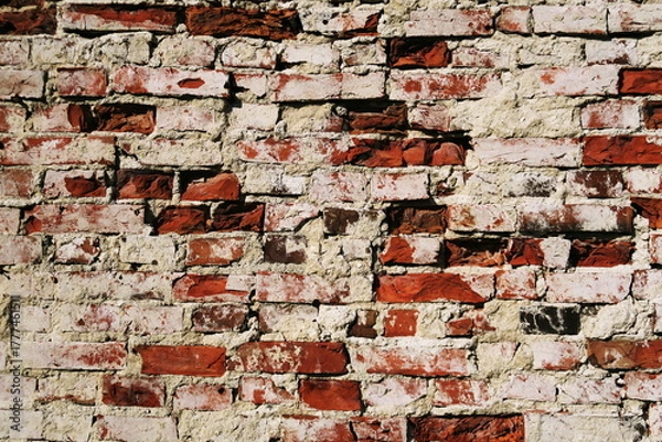 Fototapeta Détail de vielle façade en briques rouges et blanches.