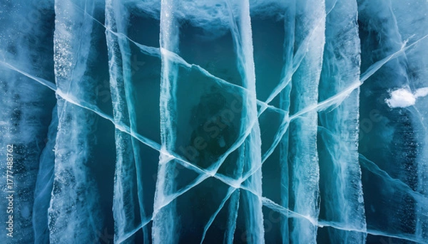 Obraz Aerial view of cracked ice with a blue color palette and natural light
