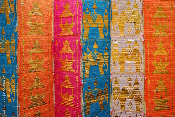 Fototapeta Multi-colored Traditional Long Flag Called Toong in the Buddhist Temple of Thailand Northern Region