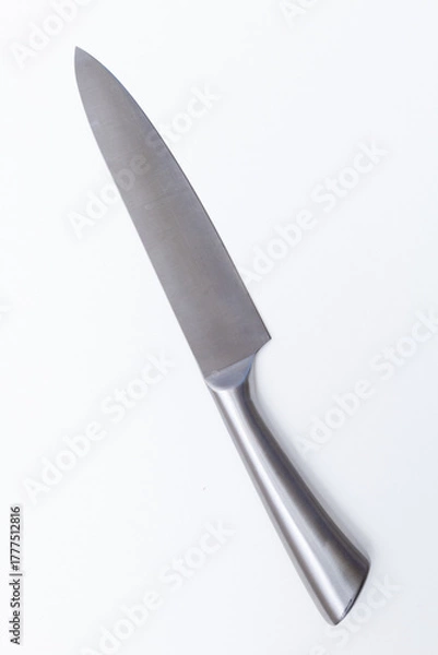 Fototapeta Isolated 8-inch chef's kitchen knife. Sharp...do not touch.