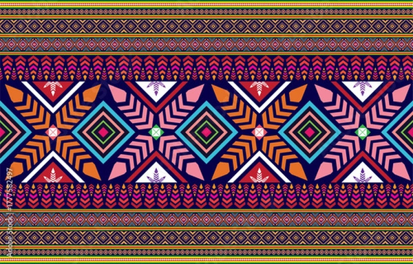 Fototapeta tribal pastel multicolor pastel Navajo seamless vector pattern. aztec abstract geometric art print in a sophisticated aztec style. Vector background with ethnic elements. Wallpaper, fabric, paper
