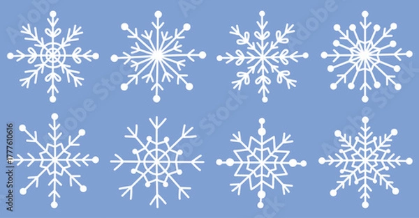 Fototapeta Set of cute white snowflakes isolated on blue background.