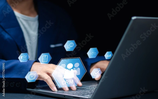 Fototapeta Businessman. glass focusing on CRM, representing customer relationship management, business strategy, data analysis, marketing automation and client retention concept.