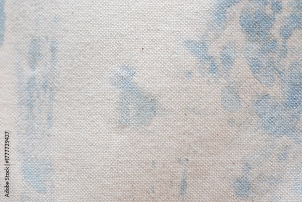 Fototapeta 藍染液でムラができたアートな柄のキャンバス生地背景素材