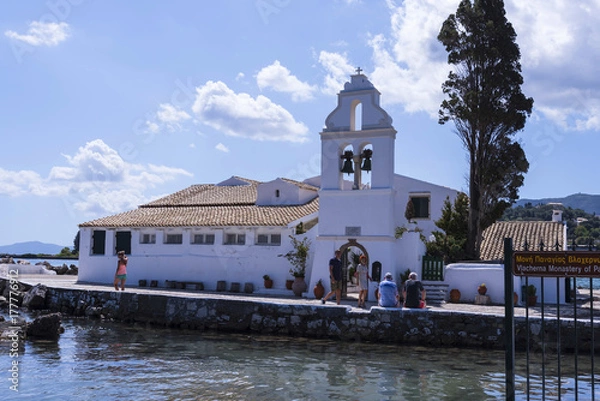 Fototapeta The church of Panagia Vlacherna in the Bay at Kanoni on the Greek Island Of Corfu