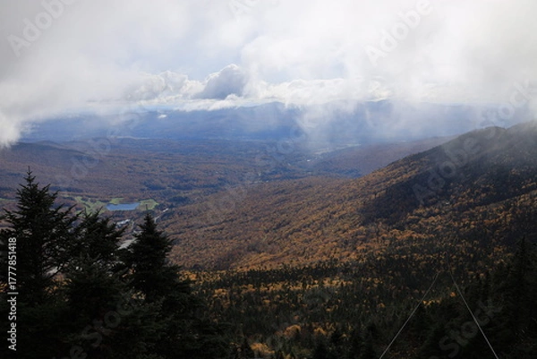 Fototapeta clouds in the mountains