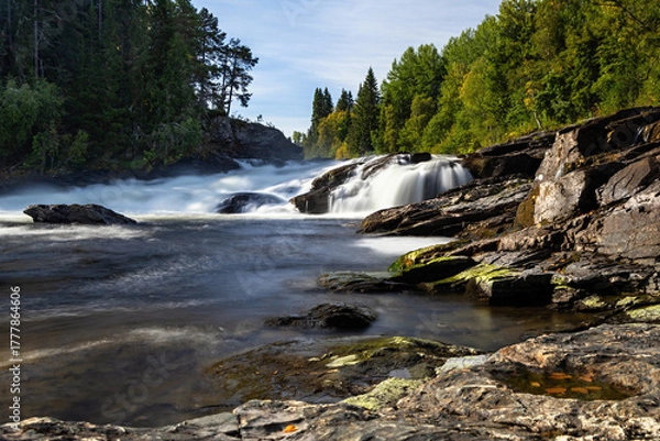 Obraz White water river rapids long exposure low angle rocks near Ristafallet waterfall in Sweden