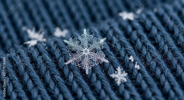 Obraz Winter Snowflake on Blue Knitted Fabric Macro.