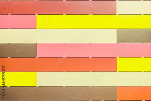 Fototapeta Colorful wall with Horizontal soft pastel panels in pink, yellow, cream, and brown, tender striped background. Abstract minimalism, light backdrop design, copy space