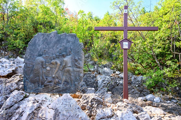 Obraz Station IX: Jesus falls for the third time. The Way of the Cross on Mount Križevac (the Cross Mountain) in Medjugorje.