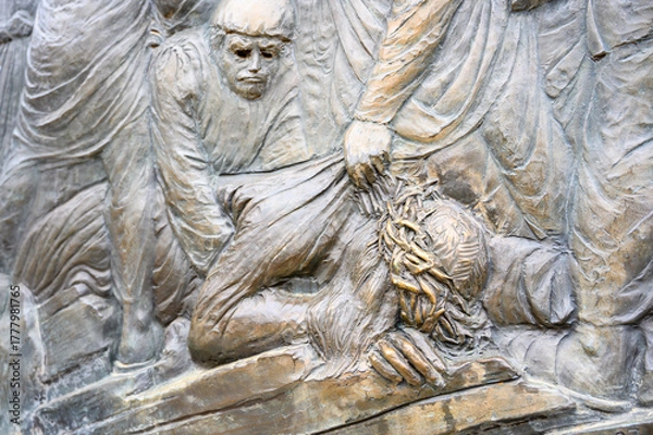 Obraz Station IX: Jesus falls for the third time. The Way of the Cross on Mount Križevac (the Cross Mountain) in Medjugorje.