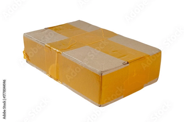 Fototapeta Cardboard shipping box with yellow tape isolated transparent png
