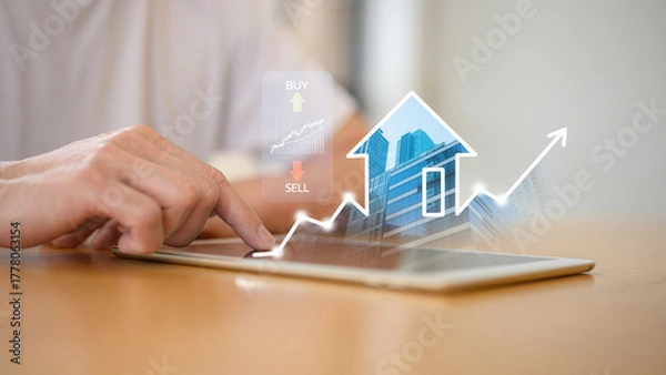 Fototapeta Businessman using digital tablet with real estate growth graph property value for real estate investment concept  new home for the family, home search, land price, property tax