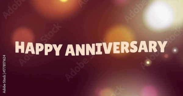 Fototapeta Displaying greeting text reading HAPPY ANNIVERSARY in digital design with glowing bokeh effect