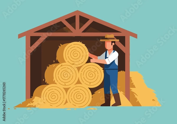 Obraz Farmer stacking round hay bales inside an opensided wooden shed