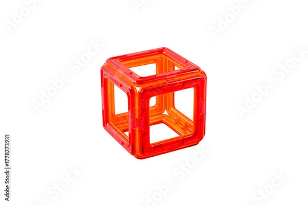 Fototapeta Educational magnetic construction toy step 2 – cube assembly process