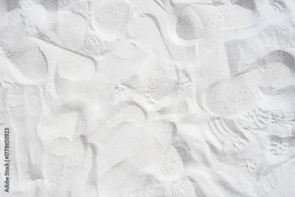 Fototapeta foot print on white beach sand. Summer vocation background. 