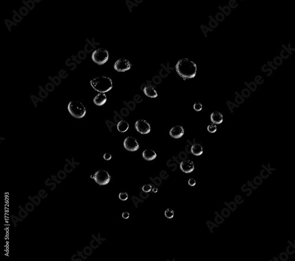 Fototapeta Transparent air bubbles rising in dark water background, creating a clean and fresh abstract texture. Perfect for concepts of purity, oxygen, freshness, and underwater design.