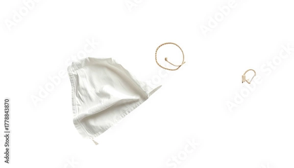 Fototapeta White fabric bag with drawstrings, against a dark background