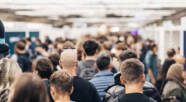 Obraz Abstract blurred people at exhibition hall of expo event trade show. Business convention show or job fair. Business concept background.