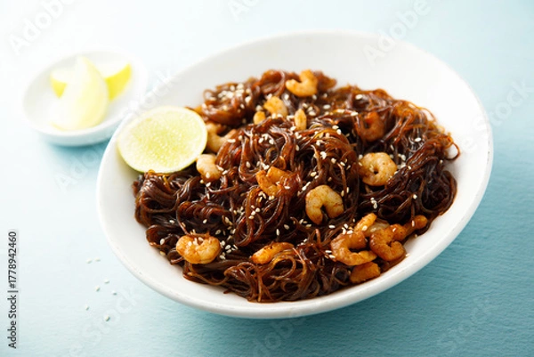 Fototapeta Shrimp noodles with lime