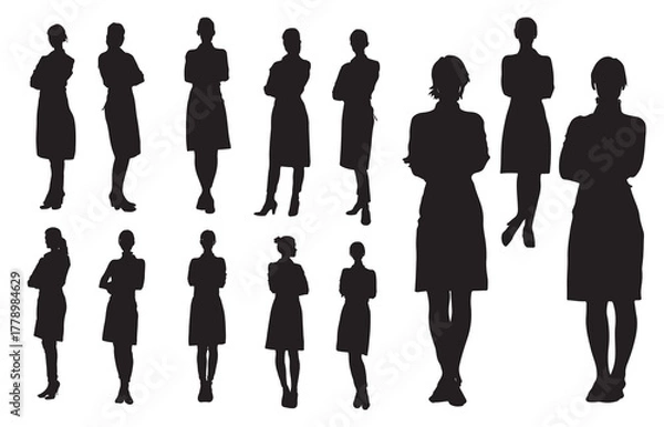 Obraz Silhouette of a businesswoman in an apron with crossed arms standing in front of a cashier. A businesswoman starting a new business. Some business concepts.

