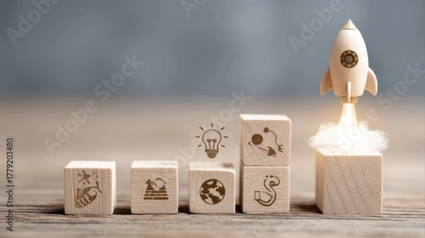 Fototapeta Rocket launching from wood cube with business icon, Start-up, Creativity, Big idea, Business goals management, Investment on new project to wealth, Company strategy target, Sustainable financial plan