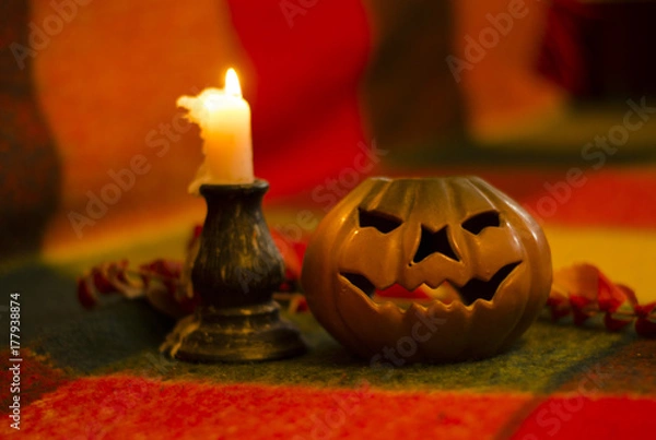 Obraz Ceramic pumpkin and candle