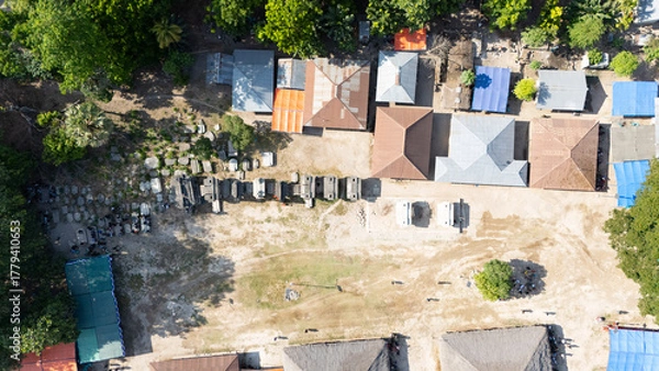 Obraz Megalithic graves made of large stones in Umabara Pau village,east sumba, seen from the air