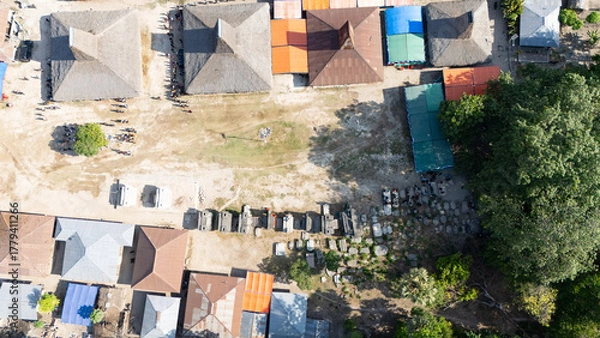 Obraz Ahead of the funeral of the King of Pau, the arriving family expressed their condolences, walking among the megalithic grave stones 