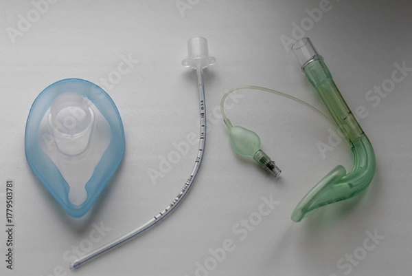 Fototapeta On the table is an endotracheal tube, oxygen and laryngeal masks. On a gray background.