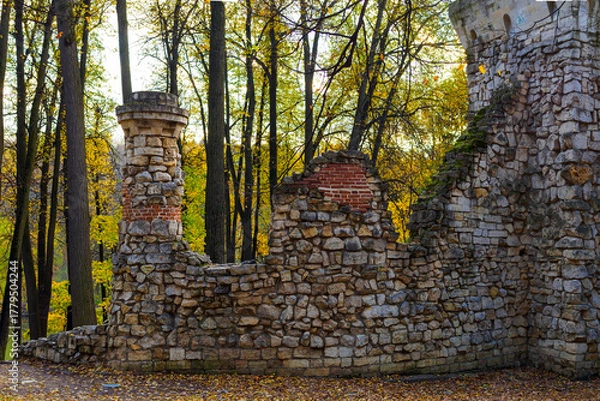 Fototapeta an ancient dilapidated tower with brick walls