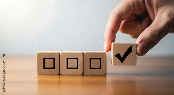 Fototapeta Hand placing a checked block in a row of empty checklist boxes