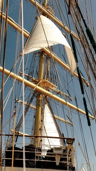 Fototapeta sails on the masts of a tall ship