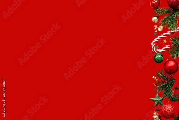 Obraz Red winter holiday Christmas frame design with gold ribbon bow, decoration, and ornate new year balls