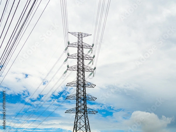Obraz High voltage electric pole power line electric transmission tower background, technology energy clean ecosystem change green environment, substation construction pylon generator grid electricity.