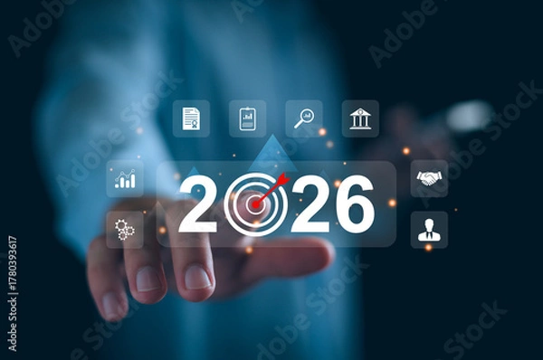 Fototapeta Business goals beginning 2026 new year concept, Businessman touching increase arrow investment graph future growth 2026. Financial planning target and strategy, Budgeting Plan and business challenge.