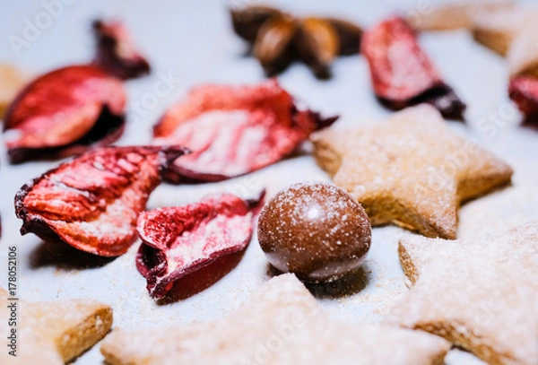 Fototapeta Festive background from cookies and dry leaves