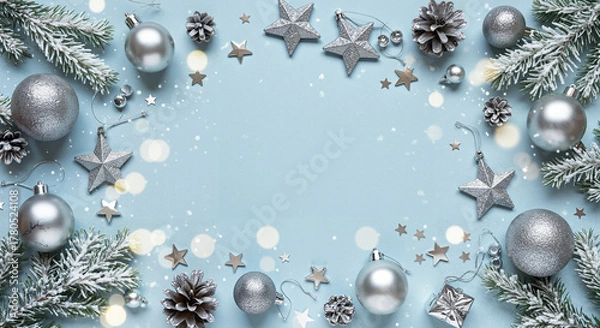 Fototapeta Silver and blue Christmas decorations with pinecones and stars  