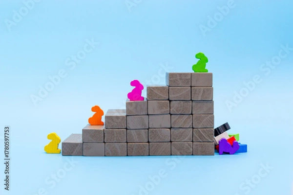 Fototapeta The concept of chasing success and falling into the abyss after achieving success