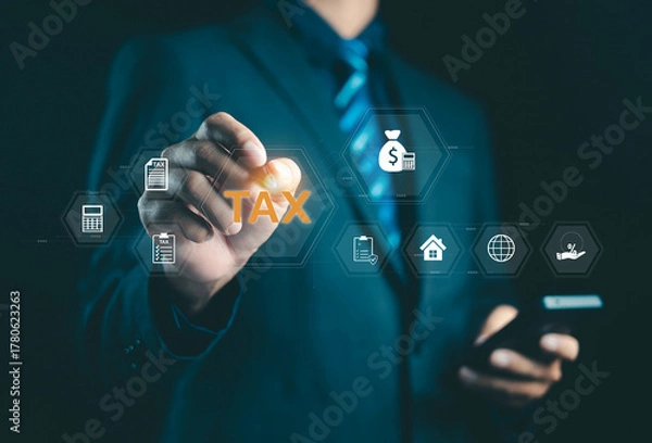 Fototapeta Businessman touching digital tax icon with finance and accounting symbols, representing taxation, financial planning, business management, and online accounting technology concept.